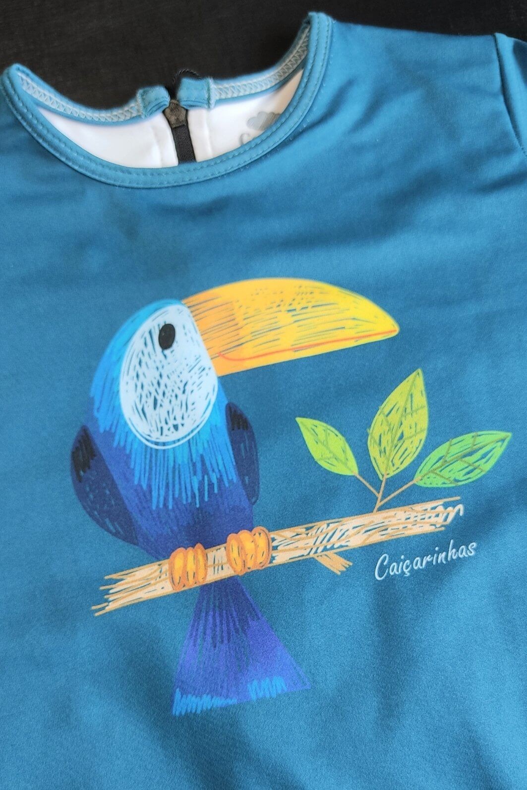Macacão Praia Bebê Proteção Solar UV 50+ Manga Curta Azul Tucano Macacão Praia Bebê Proteção Solar UV 50+ Manga Curta Azul Tucano