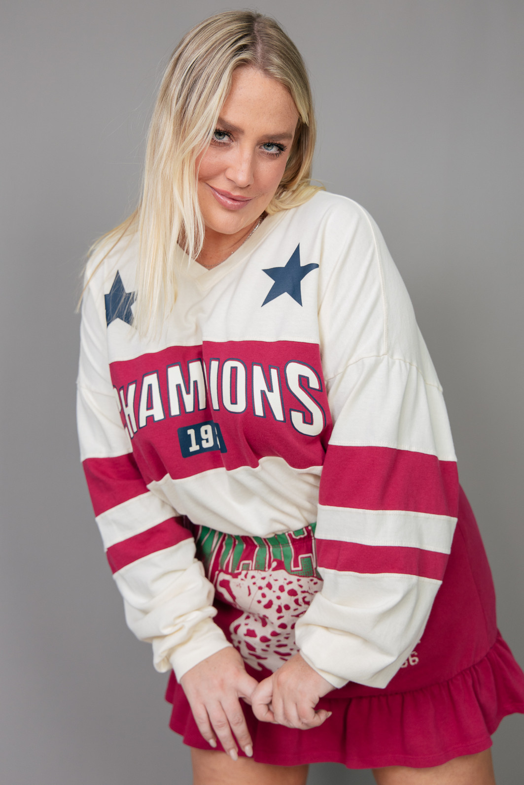 BLUSA MANGA LONGA DE MALHA OFF WHITE COM LISTRAS CHAMPIONS BLUSA MANGA LONGA DE MALHA OFF WHITE COM LISTRAS CHAMPIONS