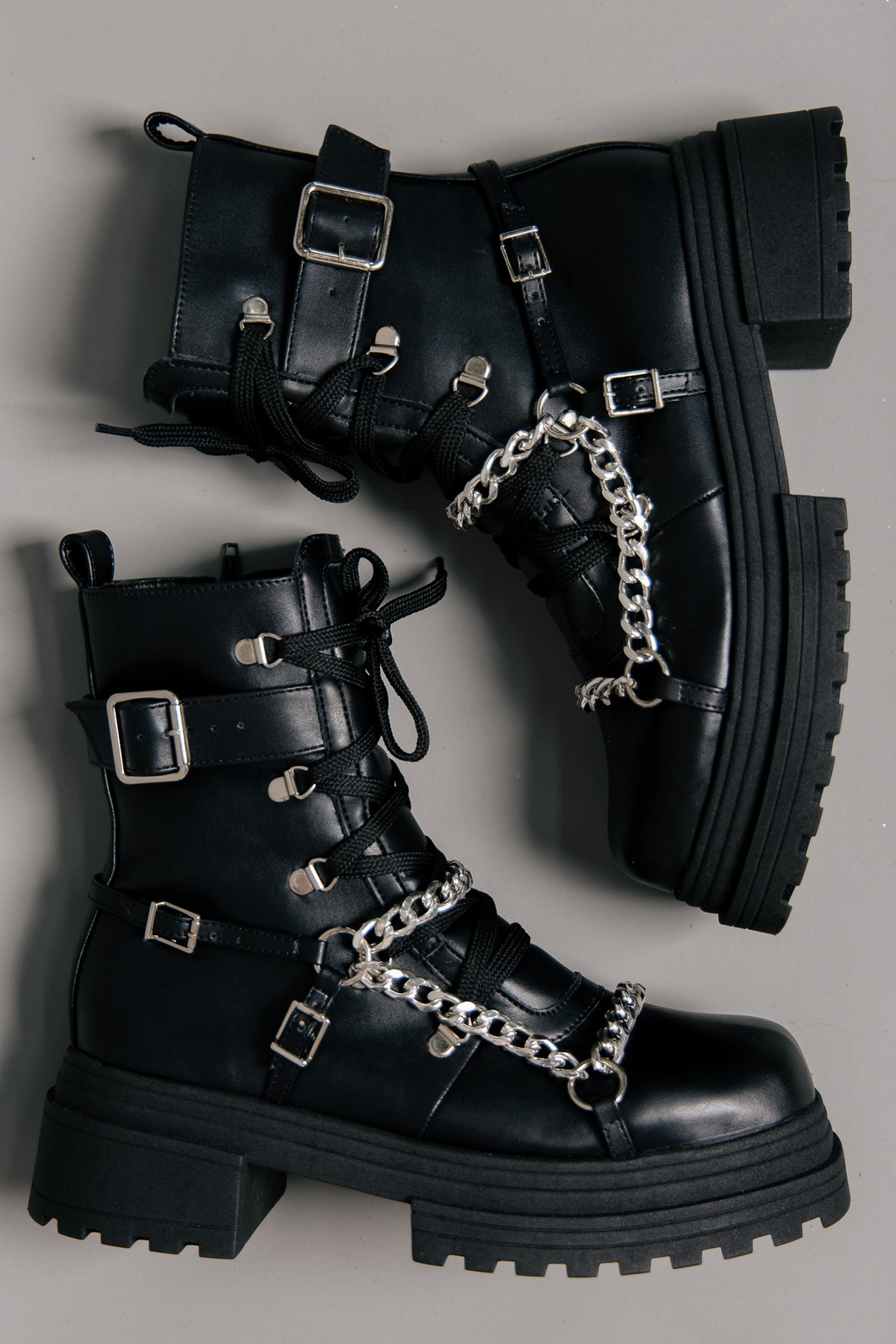 COTURNO COM FIVELAS E CORRENTES COTURNO COM FIVELAS E CORRENTES