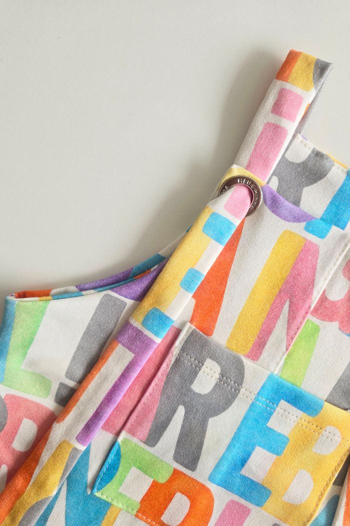 JARDINEIRA UNISSEX CURTA FELICIDADE